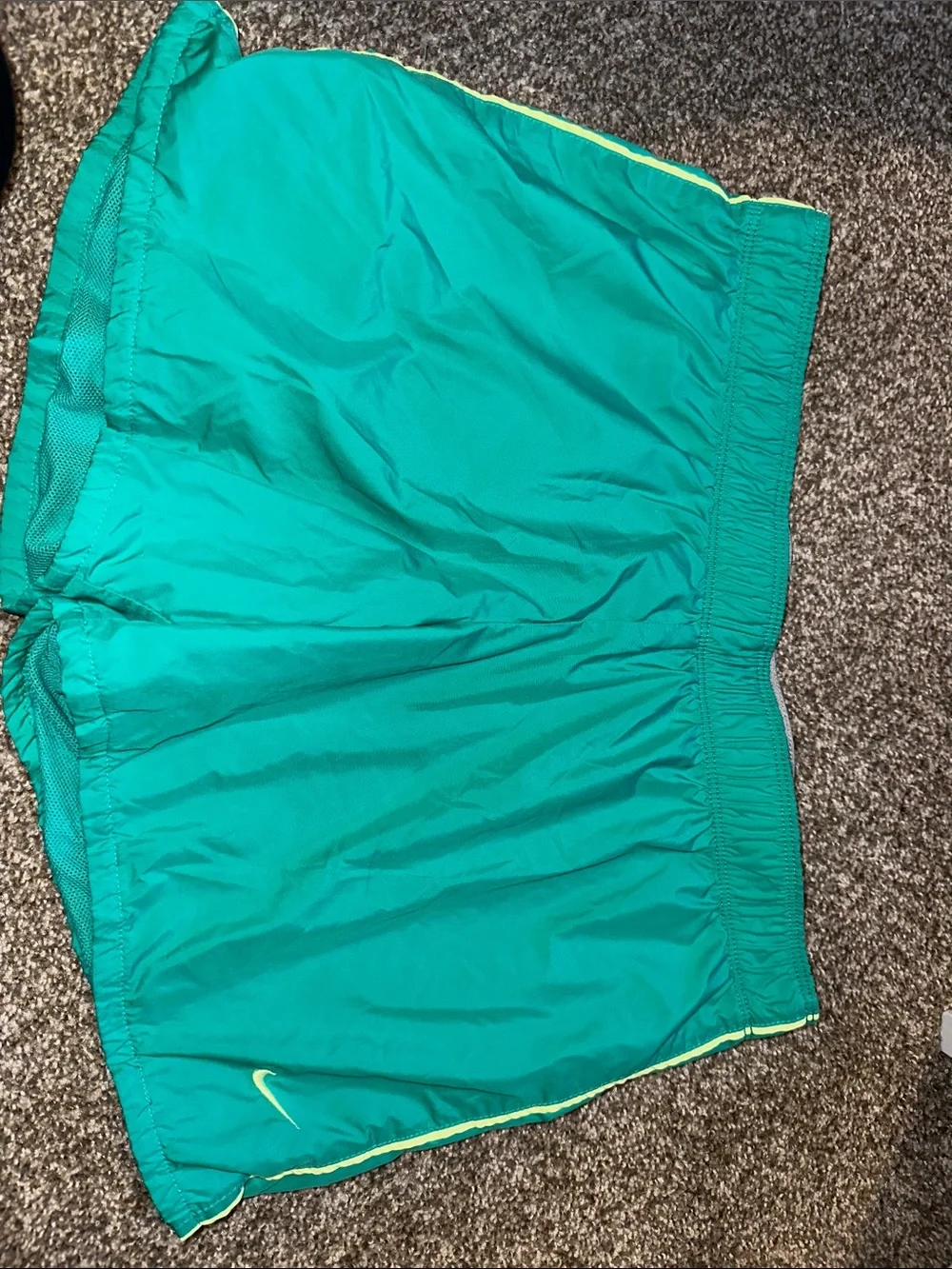 Nike Teal Running Shorts with Yellow Accent